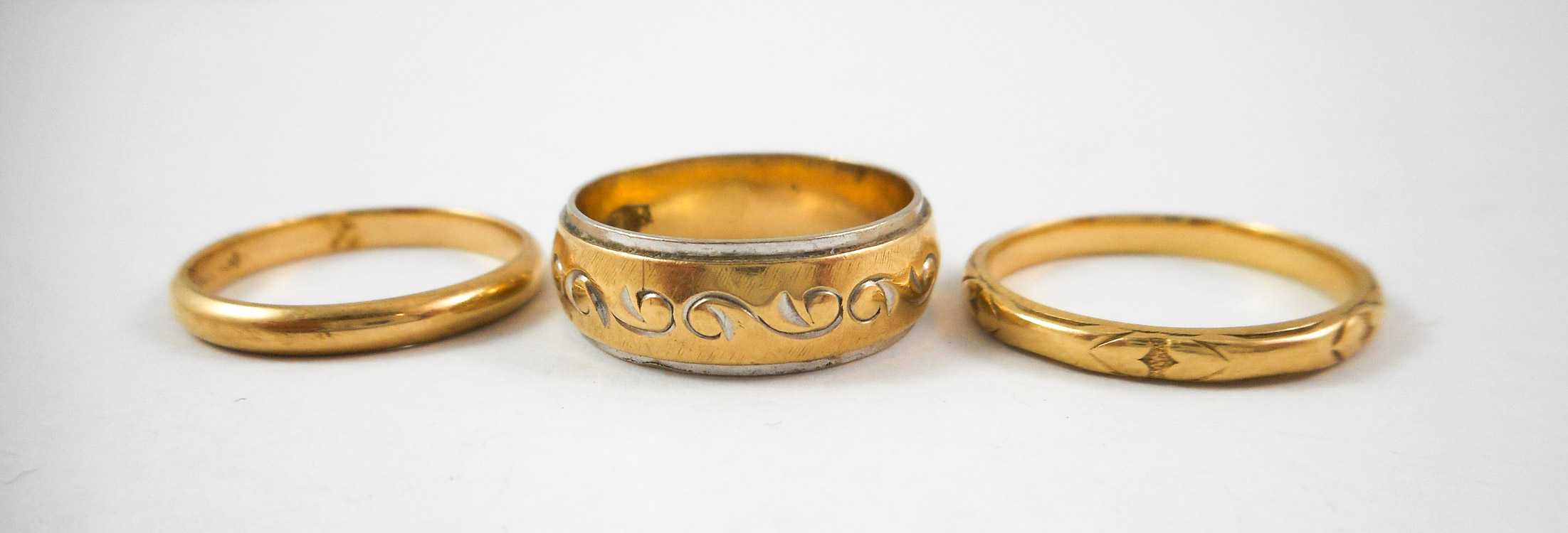 Appraisal: THREE FOURTEEN KARAT YELLOW GOLD RINGS including a size etched