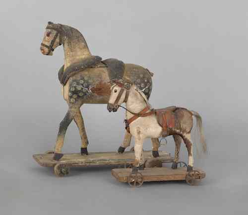 Appraisal: Two wooden horse pull toys early th c h l