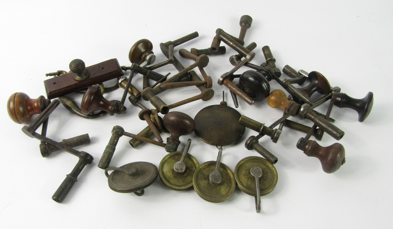 Appraisal: Clock keys pendulum drawer handles and sundries quantity