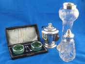 Appraisal: A cased pair of silver mounted green glass salts with