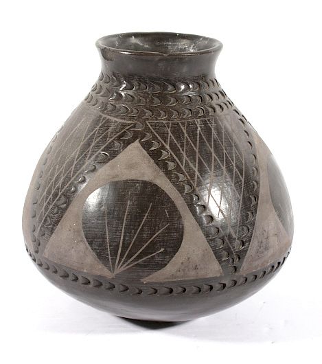 Appraisal: Black and Grey Polychrome Pottery Jar Included in this lot