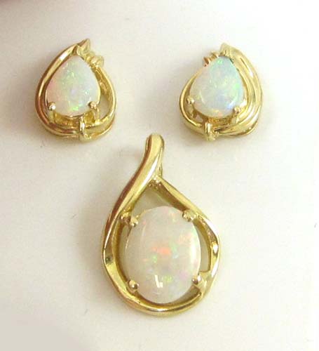 Appraisal: THREE ARTICLES OF OPAL JEWELRY including a pair of earrings