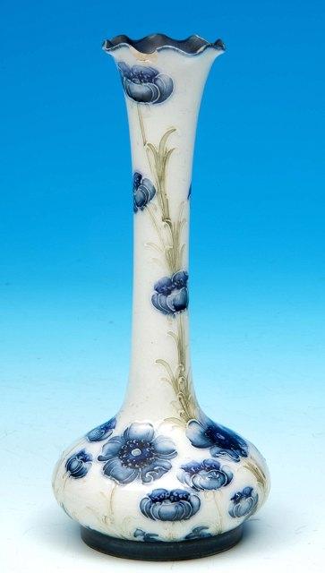 Appraisal: A Moorcroft Macintyre Florian ware vase with blue poppy design