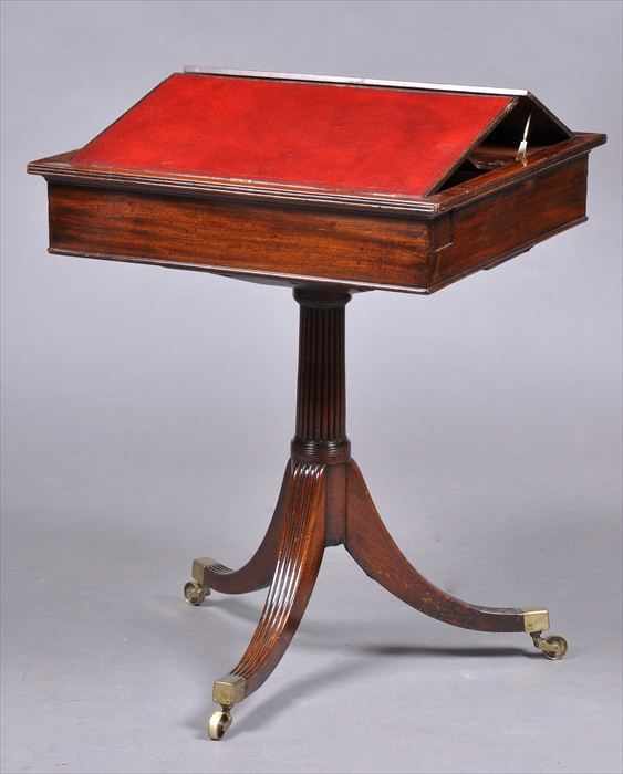 Appraisal: REGENCY CARVED MAHOGANY READING TABLE The square top with two