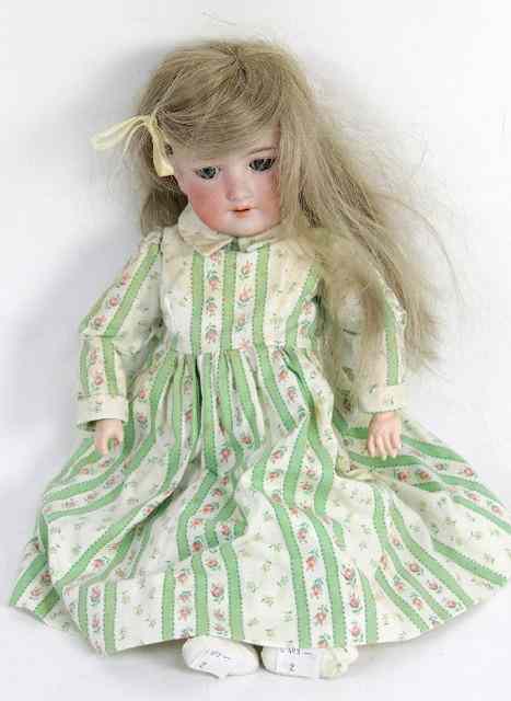 Appraisal: An Armand Marseille bisque headed doll D R G M