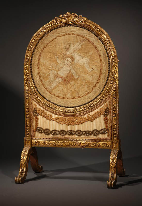 Appraisal: A Louis XVI style giltwood tapestry fire screen A Louis