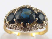 Appraisal: An carat gold sapphire and diamond ring largest sapphire approx