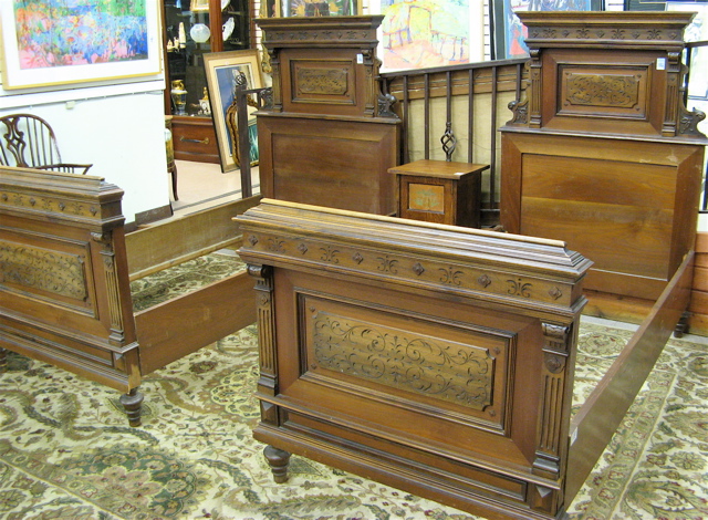 Appraisal: PAIR OF WALNUT TWIN BEDS WITH RAILS Continental c Headboard