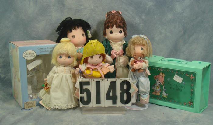 Appraisal: Precious Moments lot to inch tall dolls carry case collectible