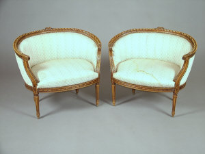 Appraisal: A pair of Louis XVI style tub chairs circa the