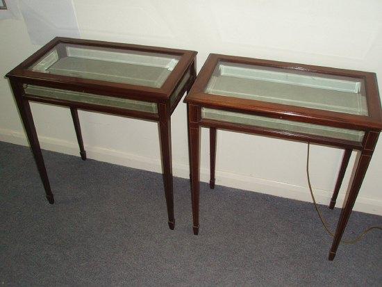 Appraisal: A closely matched pair of mahogany table vitrines each with