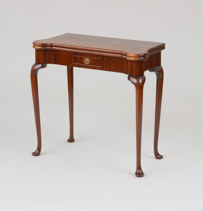 Appraisal: GEORGE II MAHOGANY CARD TABLE The hinged top with outset