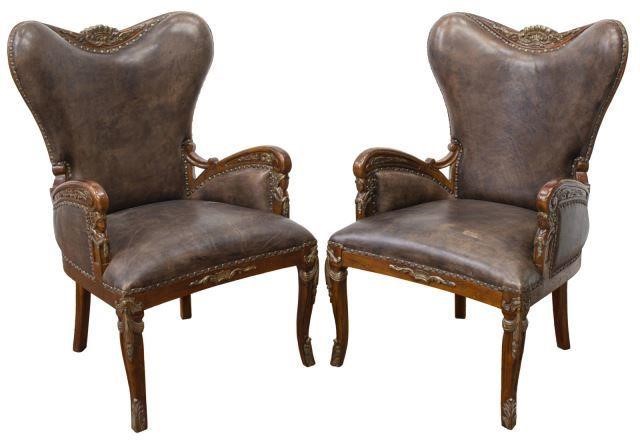 Appraisal: pair Heritage Collection leather armchairs late th c mahogany finish