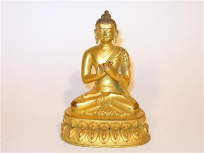 Appraisal: Sino-Tibetan gilt bronze model of Sakyamuni Single section casting seated