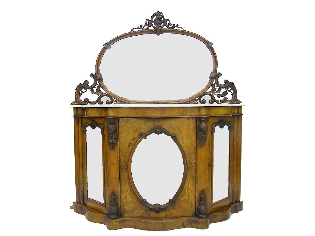 Appraisal: Victorian walnut serpentine marble top sideboard the oval mirror back