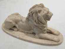 Appraisal: A Russian figure of a lion inset St Petersburg plaque