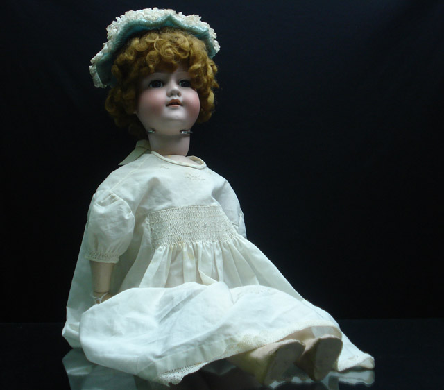 Appraisal: Armand Marseille pale bisque head doll with sleeping blue glass