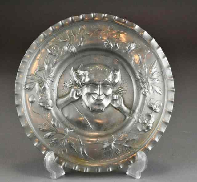 Appraisal: Kaiser Zinn Pewter Plate of Laughing BacchusPewter decorative plate of