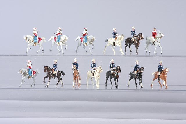 Appraisal: Lot of metal mounted figures representing French Colonial officers and