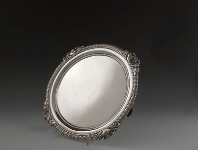 Appraisal: A George III silver waiter by John Mewburn London circular