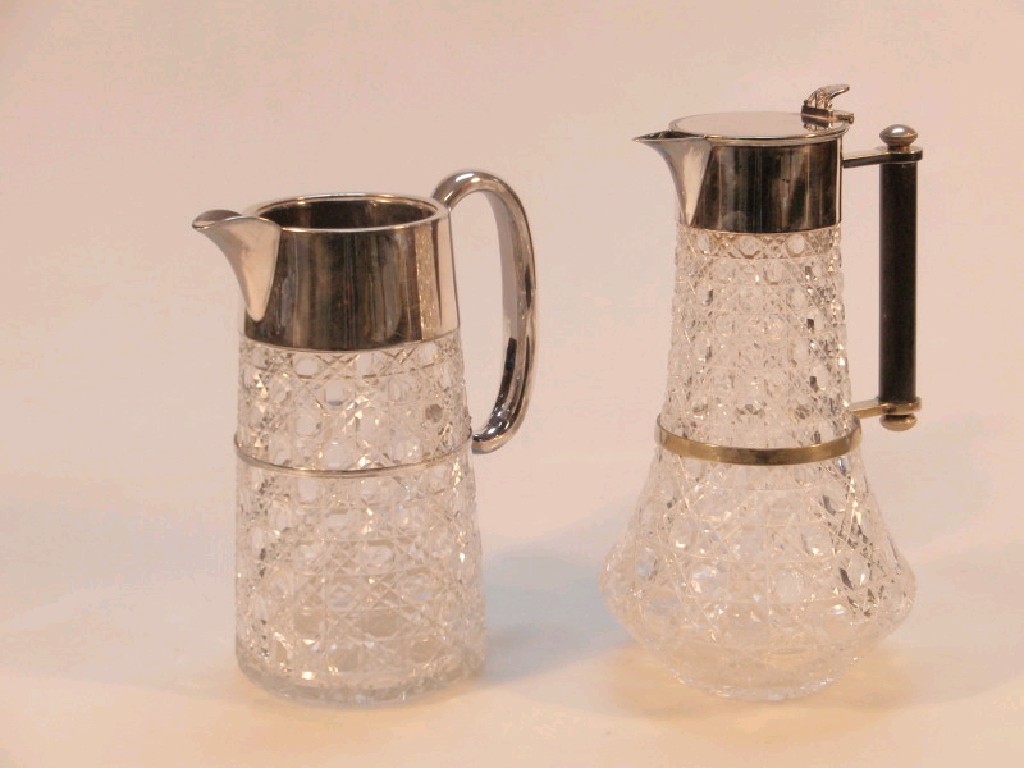 Appraisal: A thC cut glass claret jug with electroplated mounts and