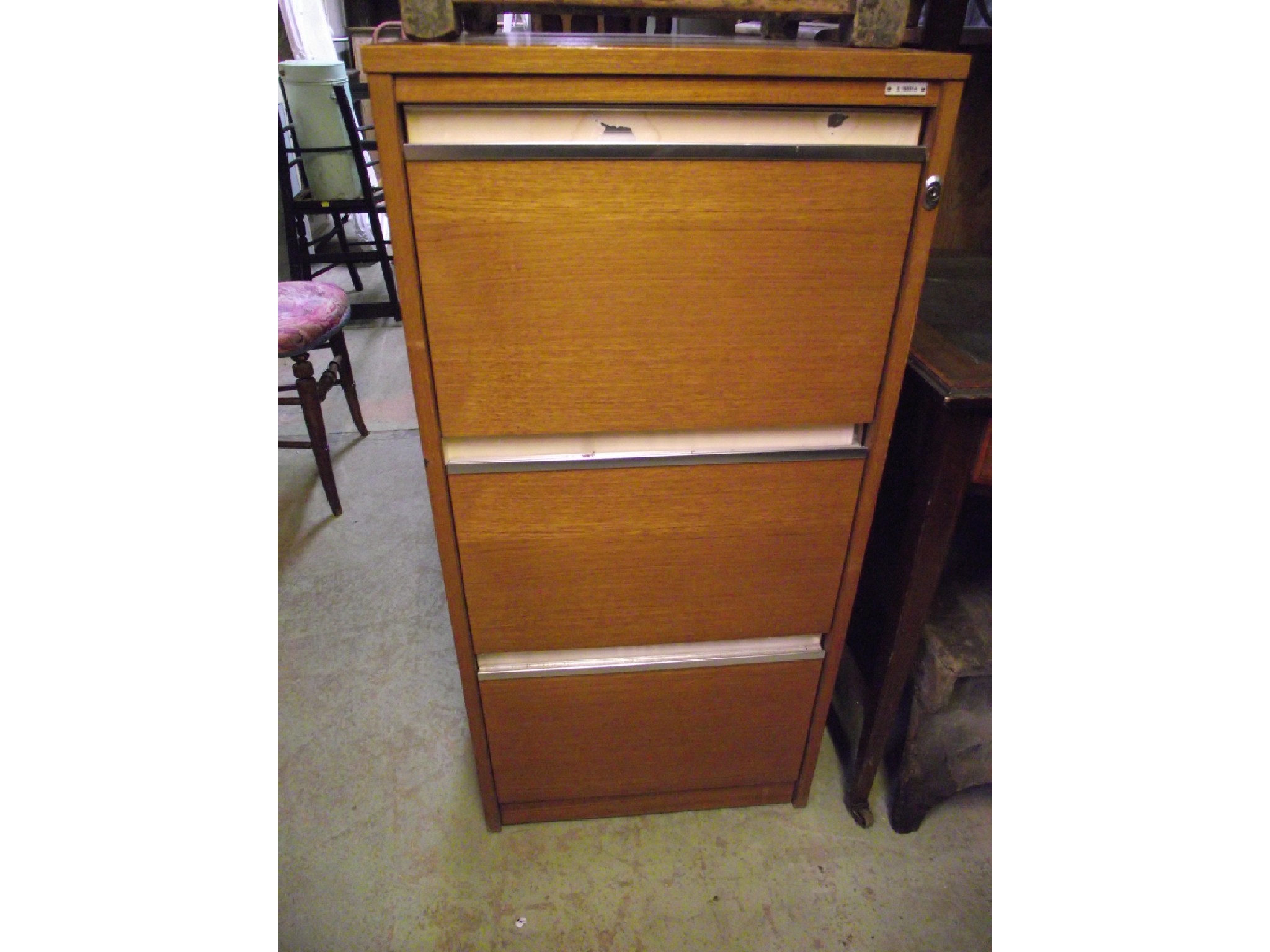 Appraisal: A mid to late th century teak framed floorstanding three