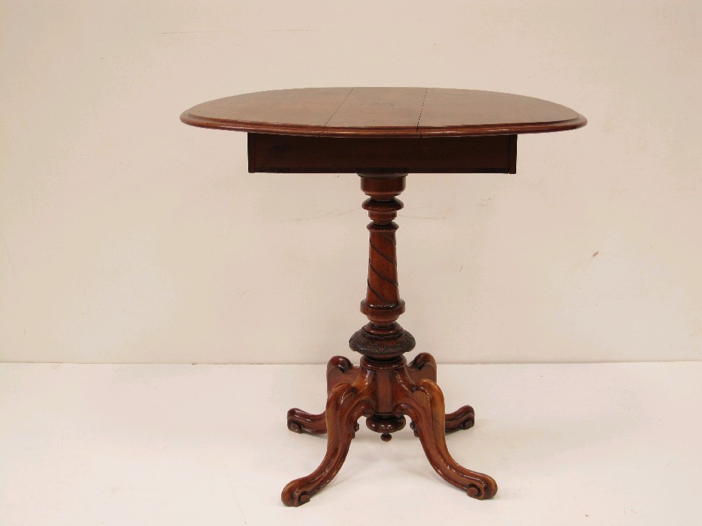 Appraisal: A Victorian burr walnut Occasional Table with drop leaves fitted