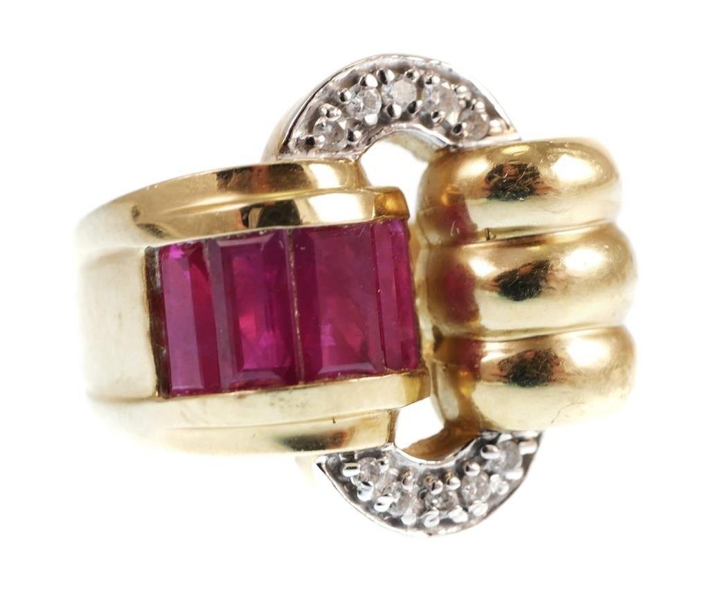 Appraisal: K yellow gold ring contains baguette cut lab grow rubies