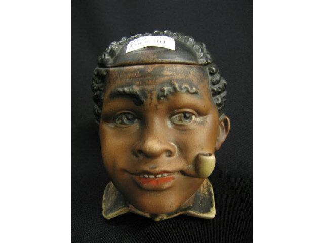 Appraisal: Black Americana Figural Pottery Tobacco Jar boy with pipe excellent