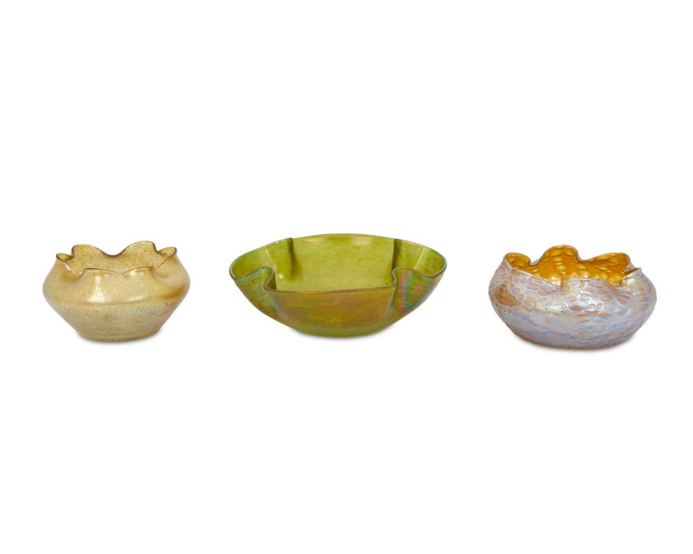 Appraisal: Three Loetz-style art glass bowls Late th early th Century