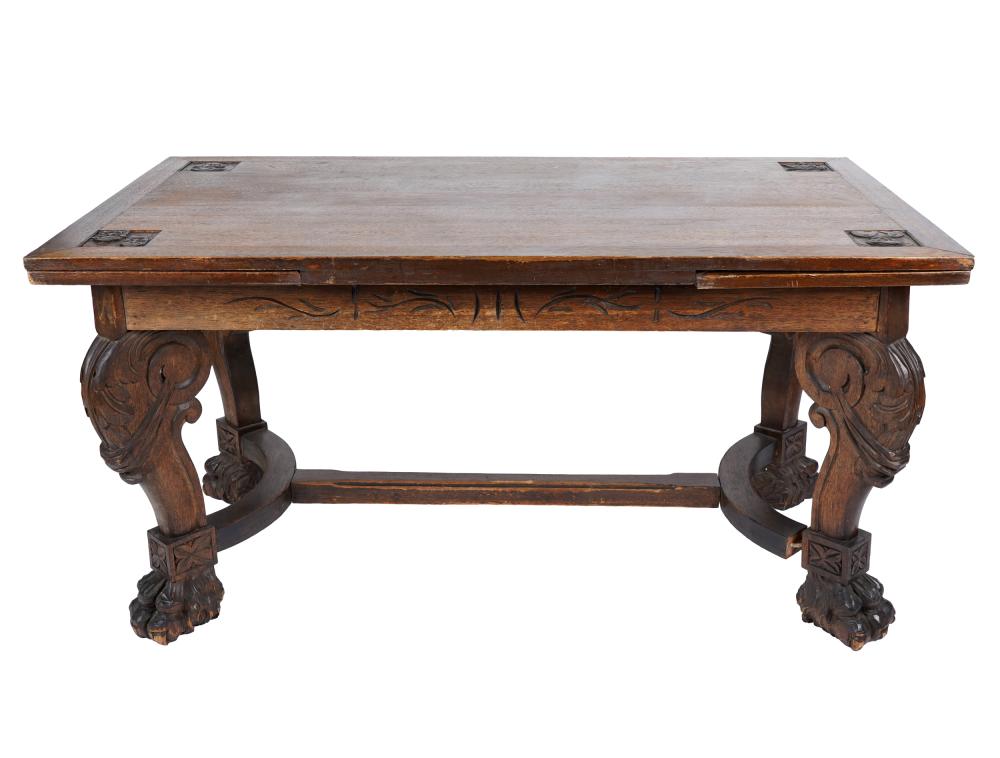 Appraisal: BAROQUE STYLE CARVED OAK EXTENDING TABLEthe rectangular top relief-carved to