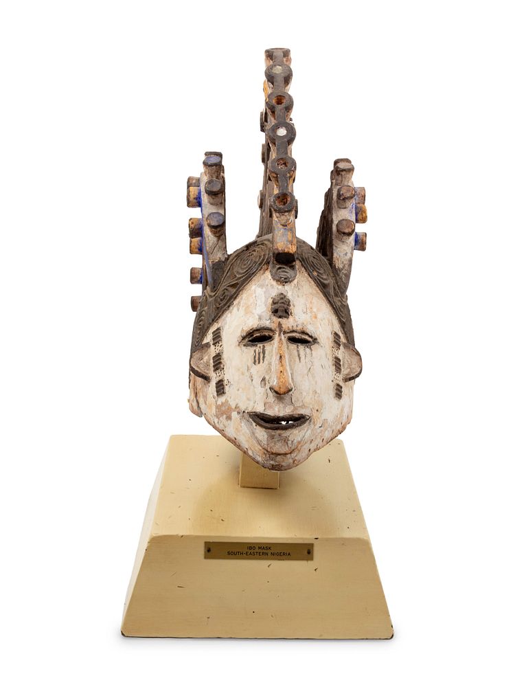 Appraisal: An Igbo Painted Wood Mask An Igbo Painted Wood Mask