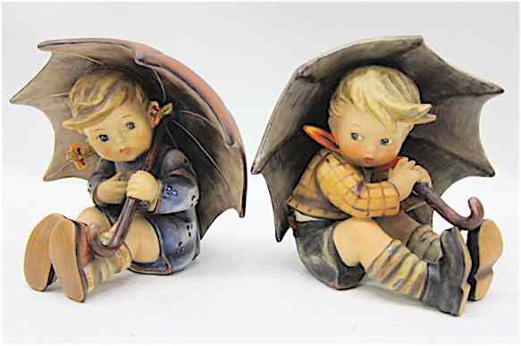 Appraisal: PAIR OF GERMAN HUMMEL FIGURINES ''Umbrella Boy '' HUM A