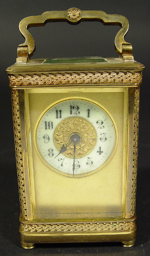 Appraisal: French brass cased carriage clock with bevelled glass panels and