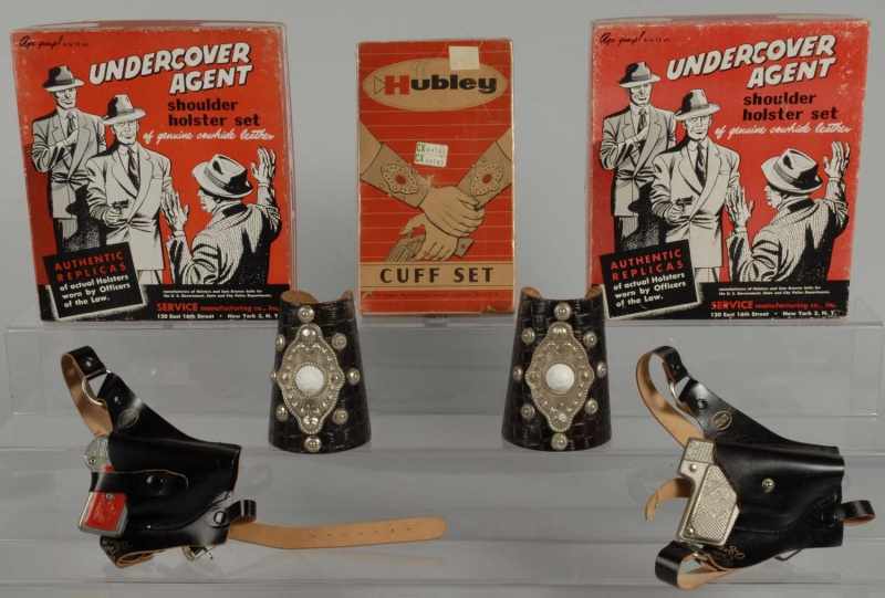 Appraisal: Lot of Undercover Gun Holster Sets Cuffs Description Includes two