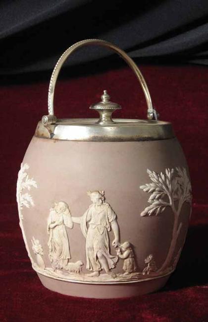 Appraisal: Wedgwood taupe swing handled biscuit barrel H in PROVENANCE The