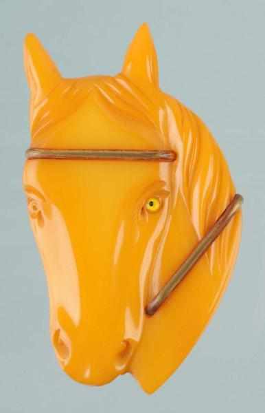 Appraisal: Bakelite Butterscotch Horse Head Pin Description CORRECTION Pin is a