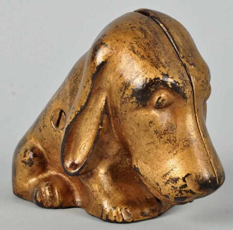 Appraisal: Cast Iron Bassett Hound Still Bank Description Rare Condition Near