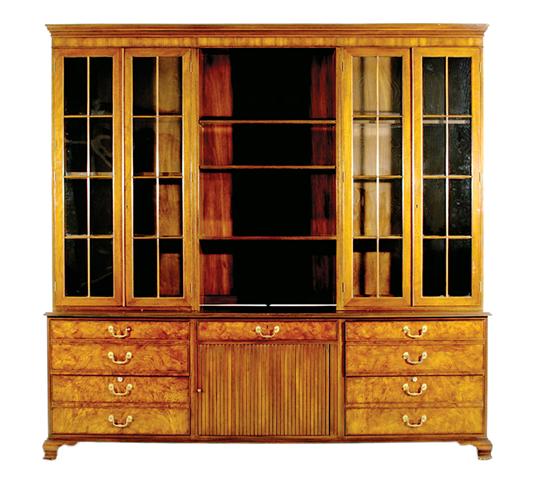 Appraisal: Kittinger mahogany and ash burl bookcase molded crown over open