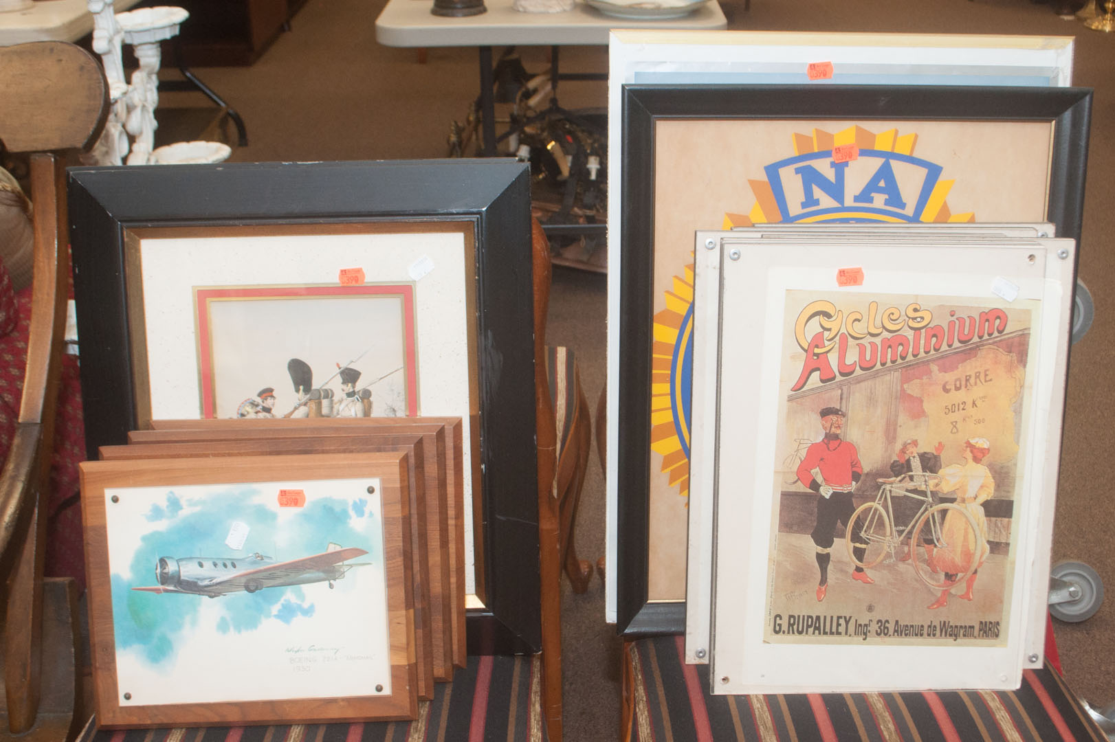 Appraisal: Assortment of framed items including four airplane prints two military