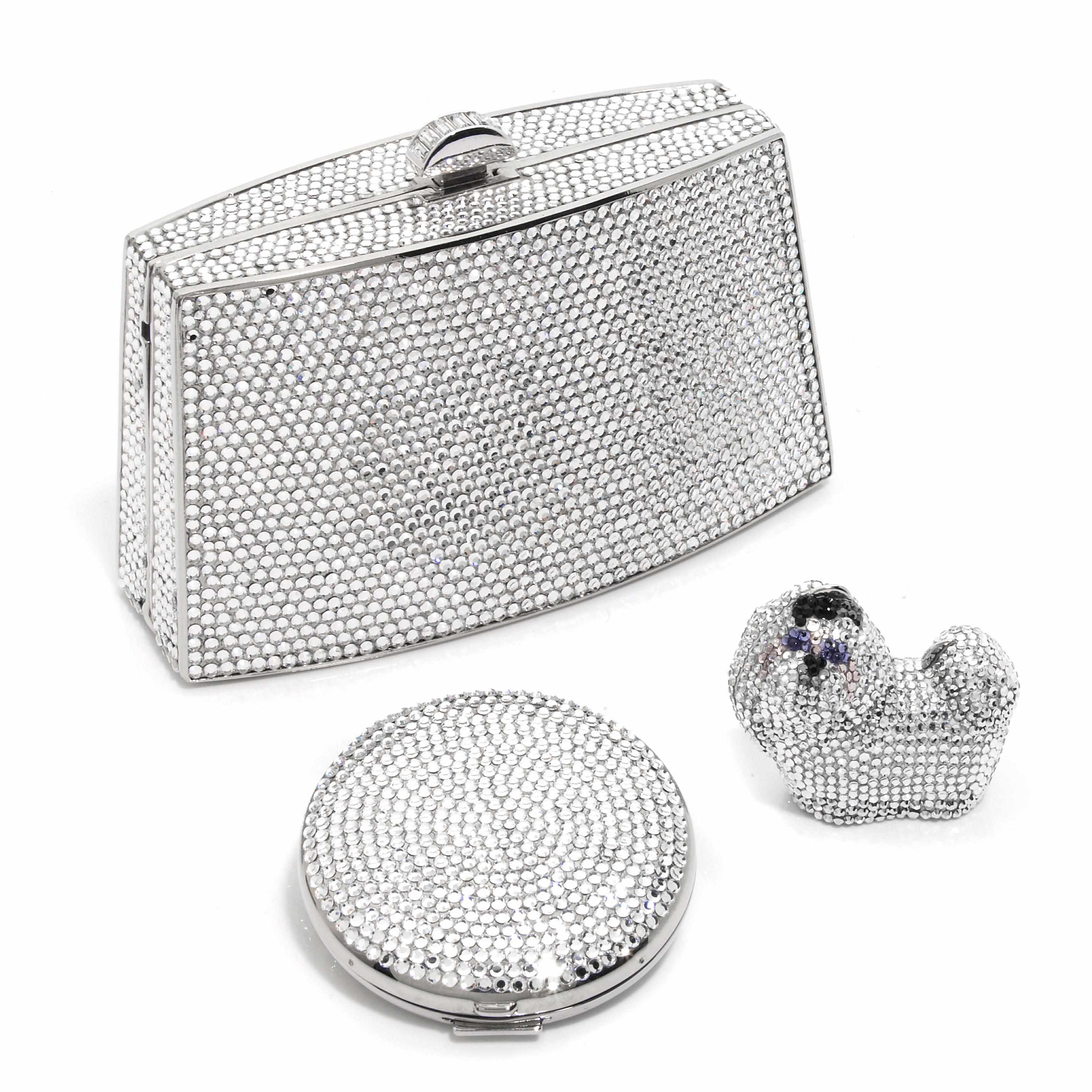 Appraisal: A bulged rectangular silver crystal purse together with a silver