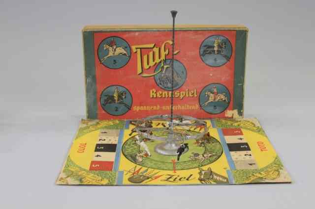 Appraisal: HORSES SPIRAL BOXED TOY Marked ''Turf Rennspiel '' hand painted