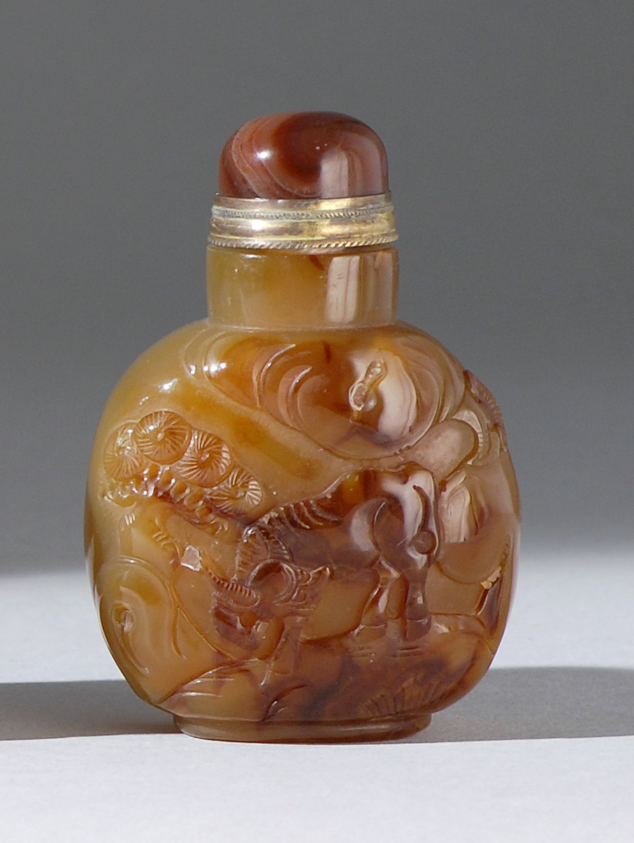 Appraisal: CHALCEDONY AGATE SNUFF BOTTLE th CenturyIn flattened ovoid form with