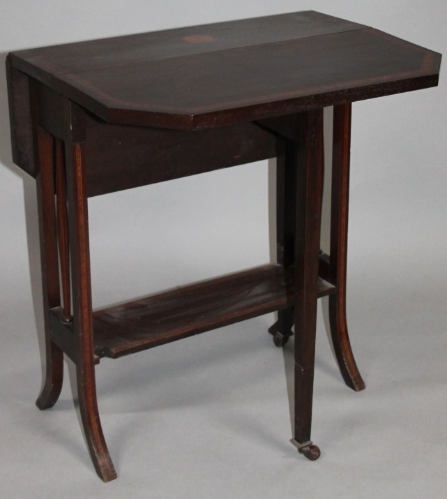 Appraisal: An Edwardian mahogany stained and boxwood strung Sutherland table of