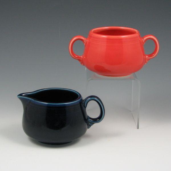 Appraisal: Fiesta creamer and sugar in Cobalt Blue and Persimmon Marked