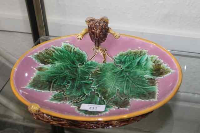 Appraisal: A VICTORIAN MAJOLICA STRAWBERRY DISH with central leaf design and