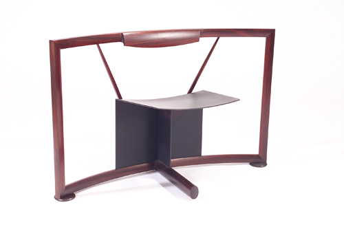 Appraisal: THOMAS HUCKER Frame-back chair in rosewood and rolled steel on