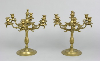 Appraisal: A Pair of Continental Brass Candelabra A pair of continental