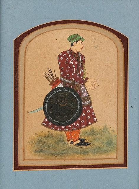 Appraisal: AN INDIAN MINIATURE painted with an archer wearing floral pattern