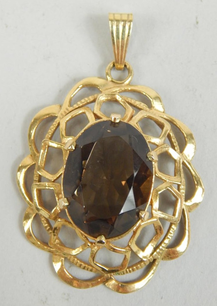 Appraisal: A ct gold filigree and smokey quartz pendant g all